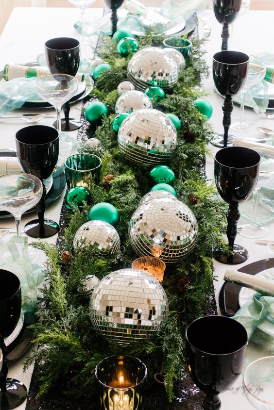 new year's eve centerpieces disco balls in greenery