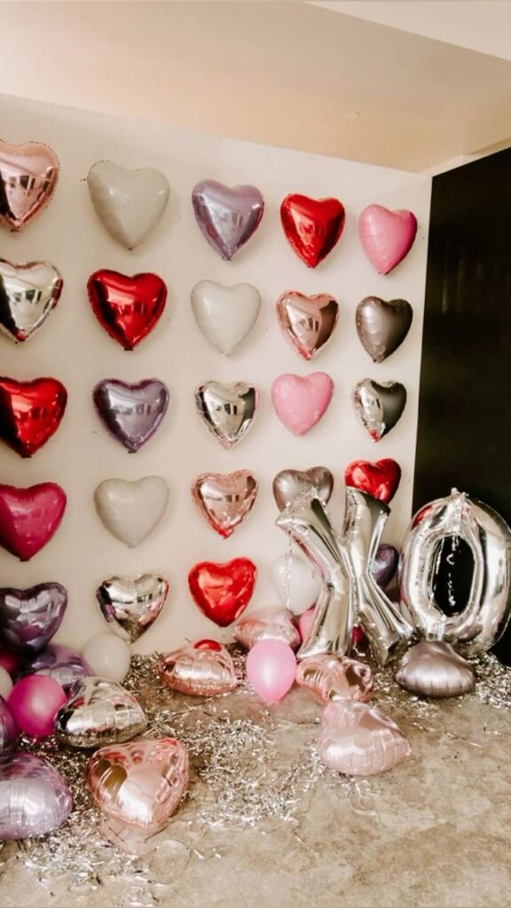 valentine's day decorations hung up heart balloons